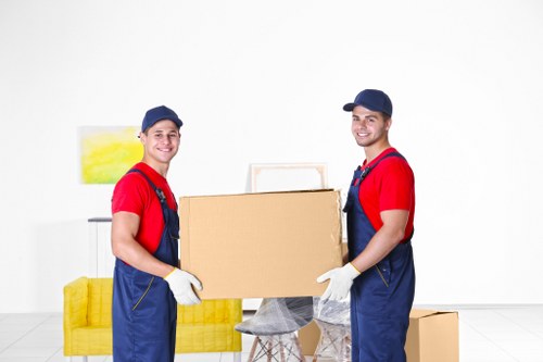 Office removals planning in Soho with moving boxes and office furniture