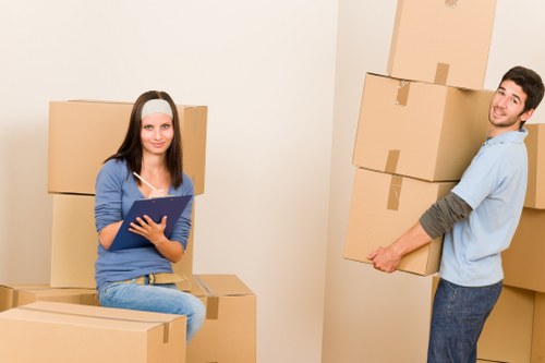 Student packing boxes and seasonal items ready for storage